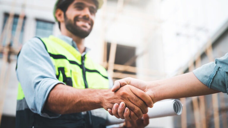 Partnership at construction site